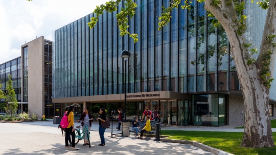 Students on University of Windsor campus outside the Essex Centre of Research